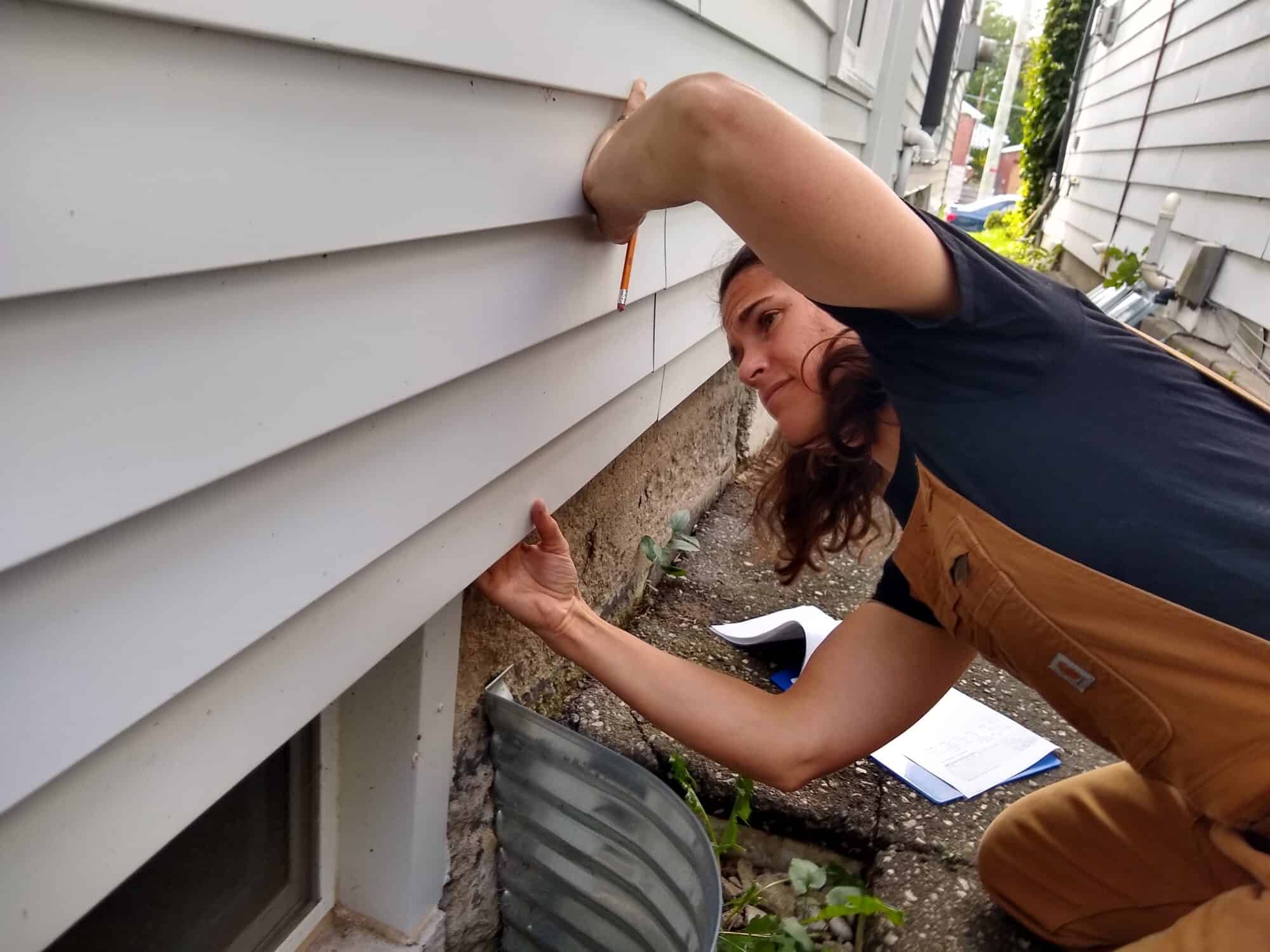 A Green Communities energy advisor at work