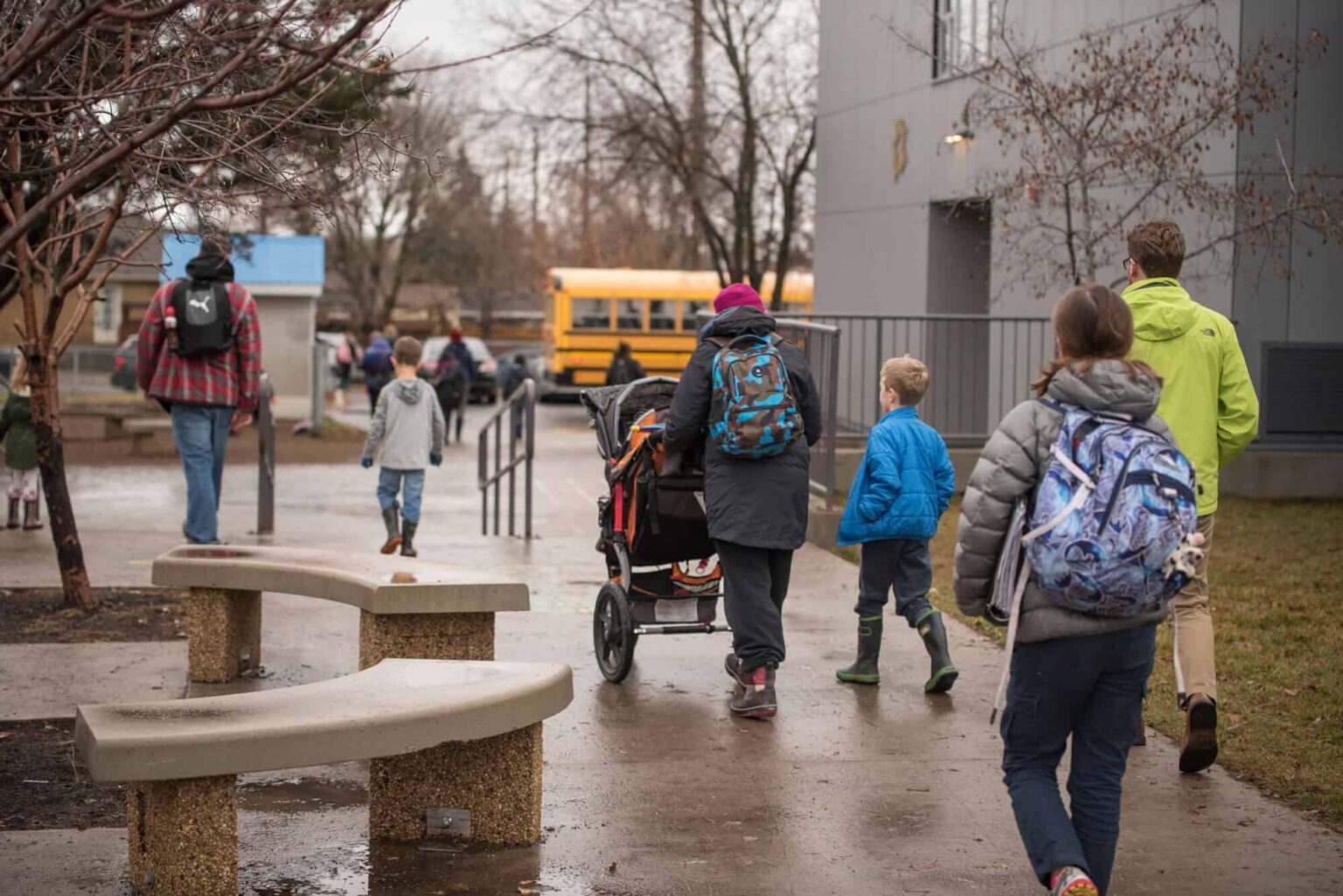 Students accompanied by parents/caregivers walking to school