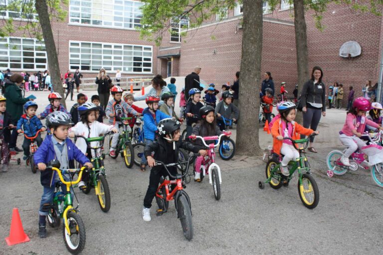 Children attending a bicycle rodeo event. From coast to coast, people of all ages are embracing cycling as a safe, accessible, transportation option for school trips. Bike to School Week 2025 (B2SW) takes place from June 2 - 6 in Toronto and Vancouver, with some different dates for other areas in Canada.
